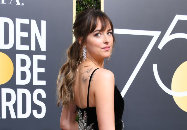 Chris Martin y Dakota Johnson demuestran su amor con un tatuaje Chris Martin y Dakota Johnson demuestran su amor con un tatuaje