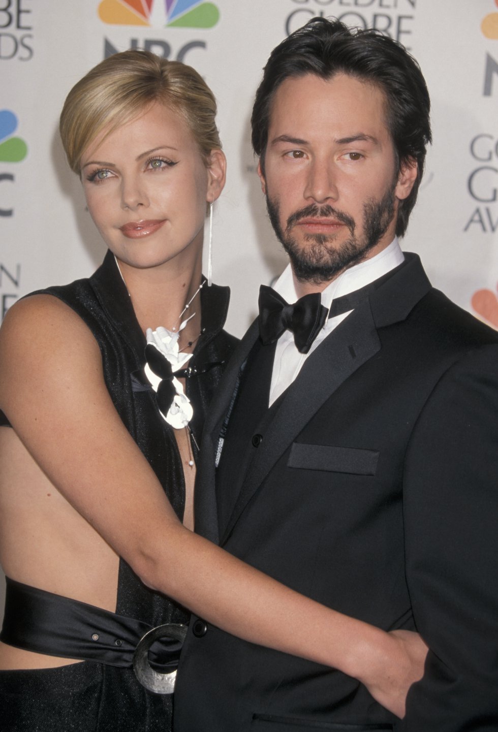Keanu Reeves & Charlize Theron