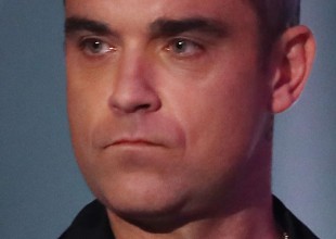 Robbie Williams canceló su gira por problemas de salud “preocupantes”