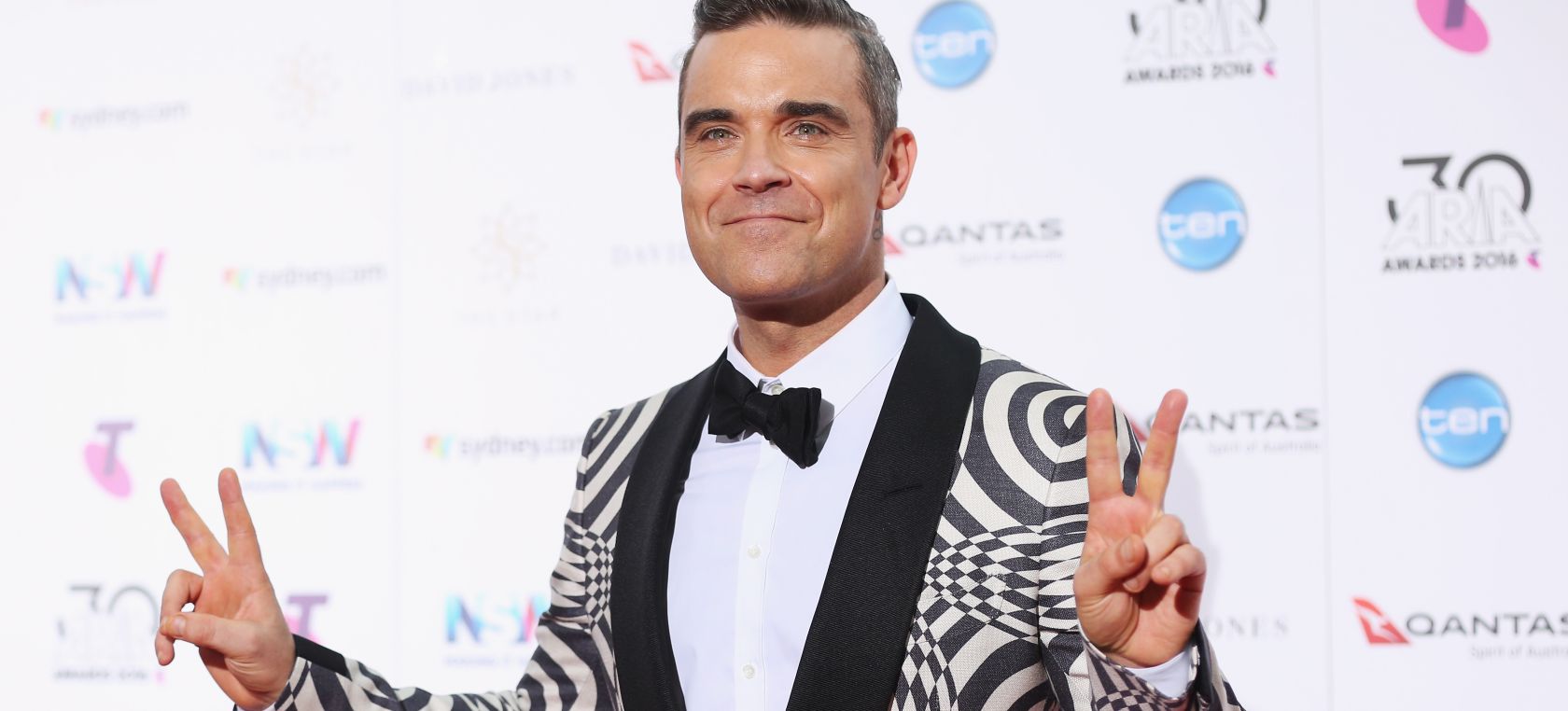 Robbie Williams tendrá una película biográfica dirigida por el creador de ‘El gran showman’