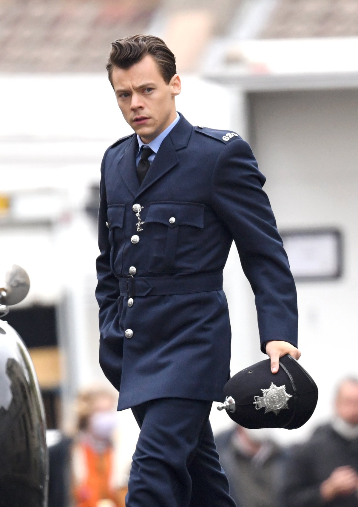 Harry Styles de policía