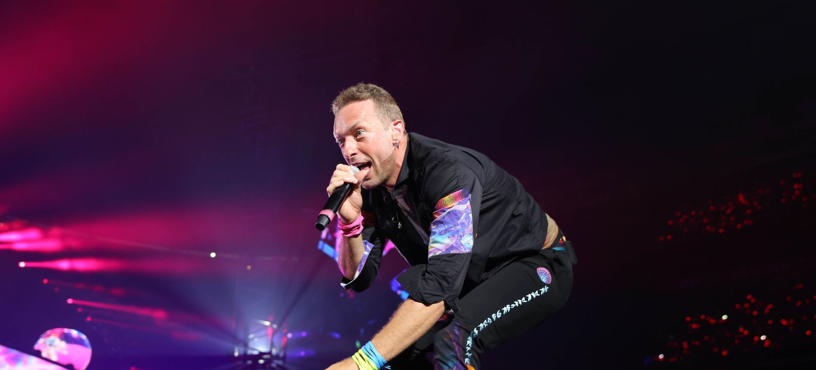 Coldplay y Bruce Springsteen cantan juntos en un concierto del grupo británico