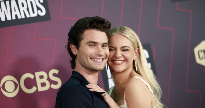 Actor Chase Stokes (“Outer Banks”) and singer Kelsea Ballerini pose together on their first red carpet